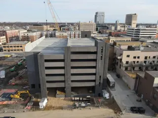 Fargo's 472-stall city-owned parking garage on track to open August 2025 as Avery, FMCT foundations take shape