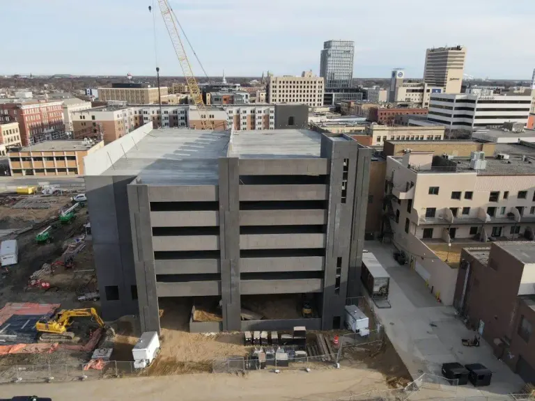 Fargo's 472-stall city-owned parking garage on track to open August 2025 as Avery, FMCT foundations take shape