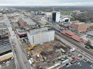 $60M NP Avenue redevelopment in downtown Fargo marks one year with 6-story ramp rising