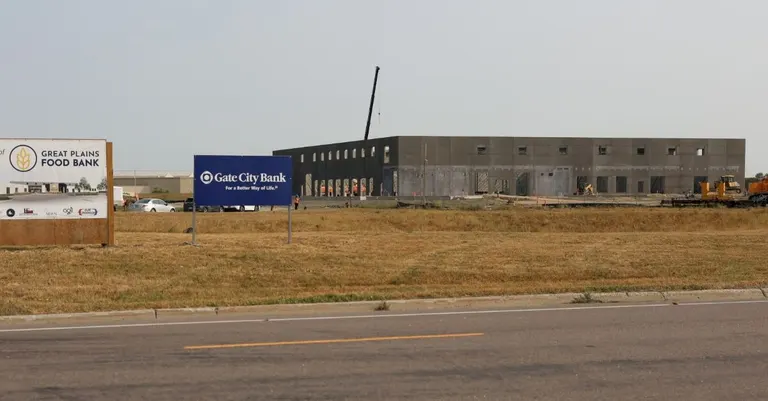 Great Plains Food Bank marks construction milestone on $30M, 70,000-sq-ft distribution center