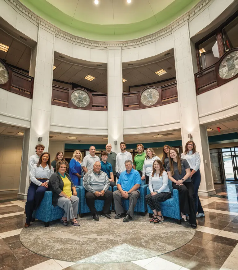 Capital Credit Union staff gathered in the domed lobby of the Fargo Central branch.