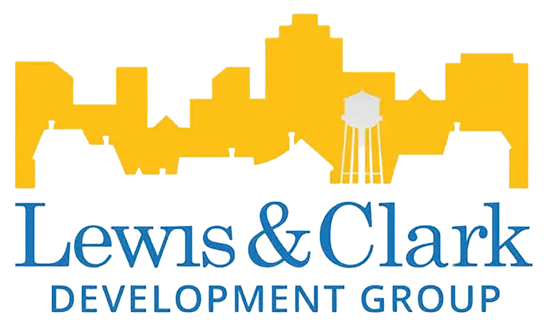 City skyline in yellow above blue “Lewis & Clark Development Group” text on black background, water tower visible.