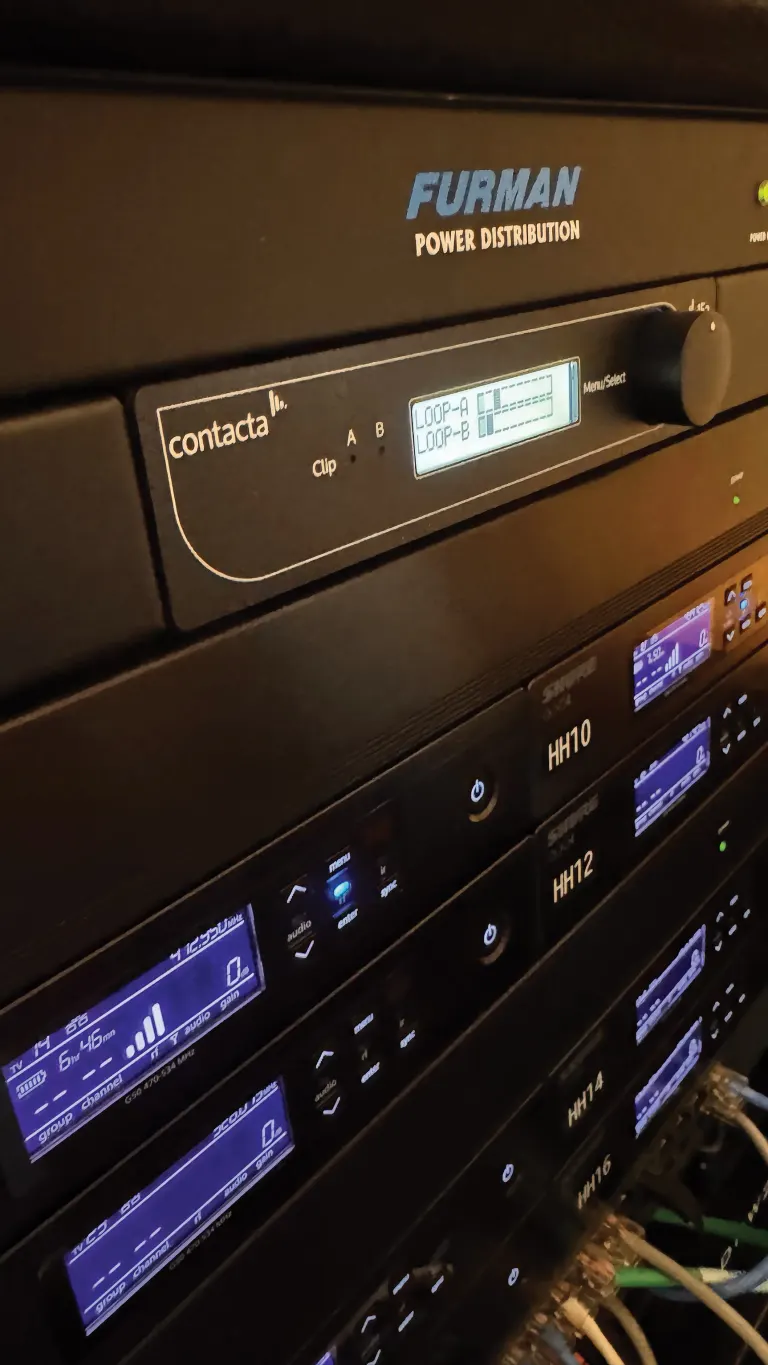 Furnan power distribution rack with front-panel control, multiple blue-lit displays, and labeled Connecta units.
