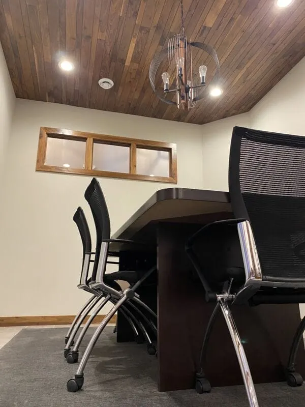 This conference room at the Dwyer Law Office was built with transom (high) windows to allow extra light into the space.