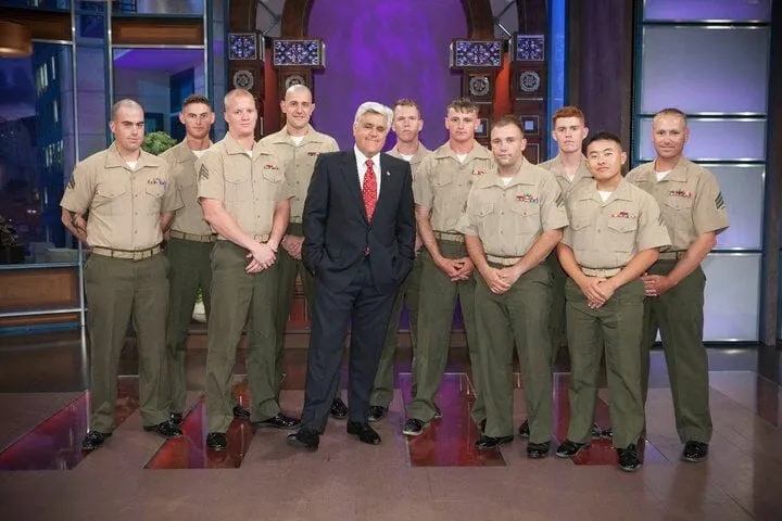 Jeremy and his fellow Marines with former late night host Jay Leno.