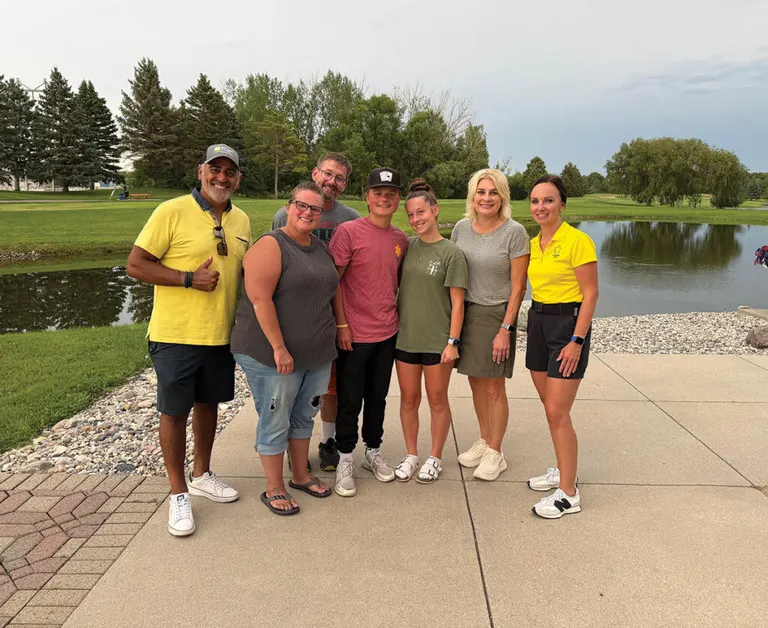 Jaxson Thomsen (middle) with family and friends. Tyrone (far left) and Maureen Bartelt (far right)