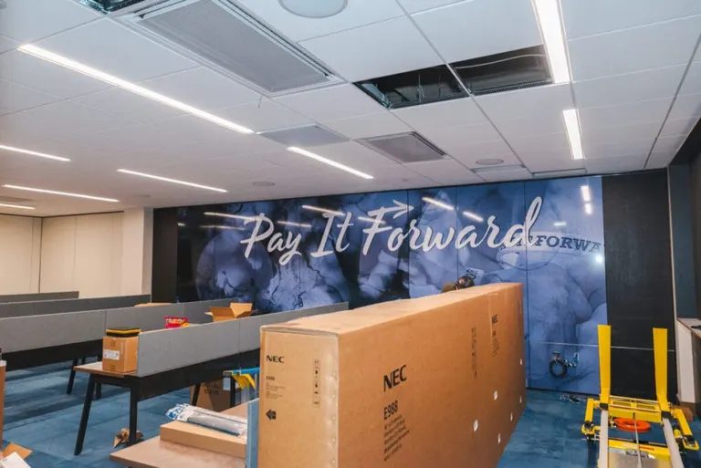 “This room is dedicated to our Pay It Forward program,” Brantner said. “We’ve given away about $30 million in the last 16 years through this program.”