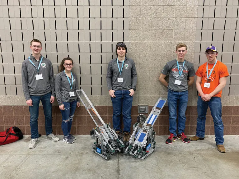 Kyle (left) was all about robotics growing up.