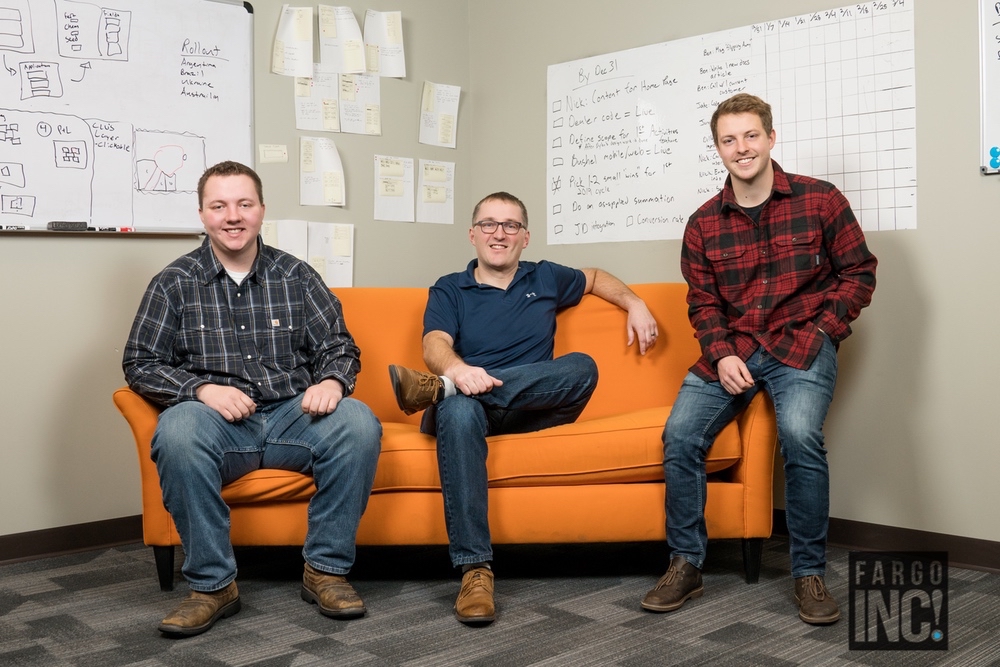 This photo was taken on December 28 last year in the middle of a blizzard. Ben Longlet (Customer Success), Nick Horob and Jake Humphrey (Software Developer) sit in their old office at the NDSU Research and Technology Park.  