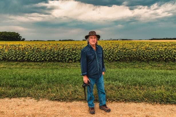 Mark Fox standing in front of a field